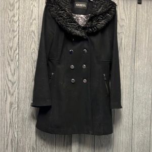 Black, fully lined. Zipper pockets and faux fur collar.